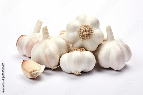 Garlic stands out against a clear white backdrop, emphasizing its distinctive form and appealing texture.