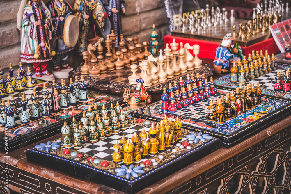 Beautiful multi-colored chess souvenir figurines in oriental style design