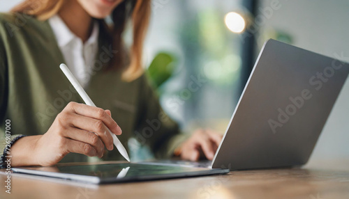 woman working from home  signing digitally with a stylus pen on a sleek tablet - modern  efficient  and tech-savvy remote work