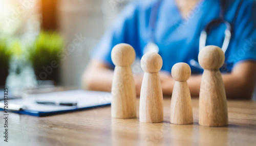 miniature wooden family figures on a doctor s table  symbolizing unity and healthcare support in a clinic or hospital setting