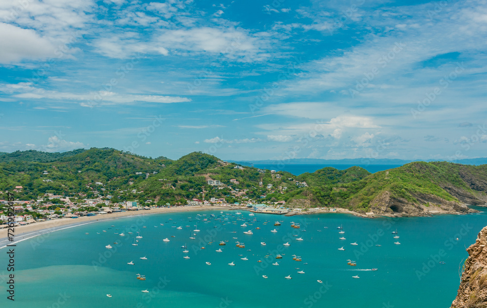San Juan del Sur bay with ships and boats on the shore. Boats on the shore of the bay of San Juan del Sur