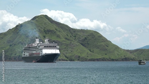 Cruise ship in the ocean. Cruise Liners beautiful white cruise ship. Above luxury cruise in the ocean. Sea at early in the morning time. Concept exclusive tourism travel on holiday. photo