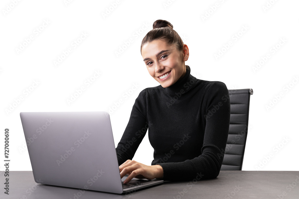 Cheerful young woman working on a laptop, casual business attire, office setting Cheerful young woman working on a laptop, casual business attire, office setting