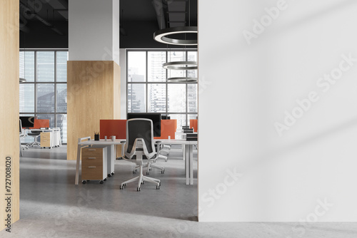 Office workplace interior with desk and pc monitors, window. Mock up wall © ImageFlow