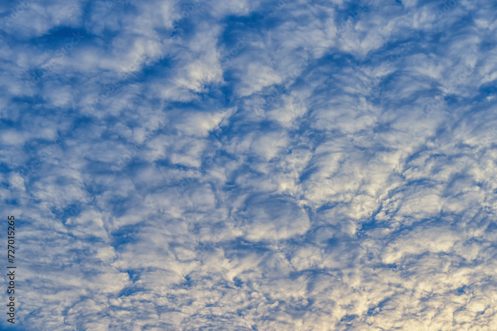 Beautiful waves of clouds against bright blue sky. Beautiful waves of clouds against bright blue sky.