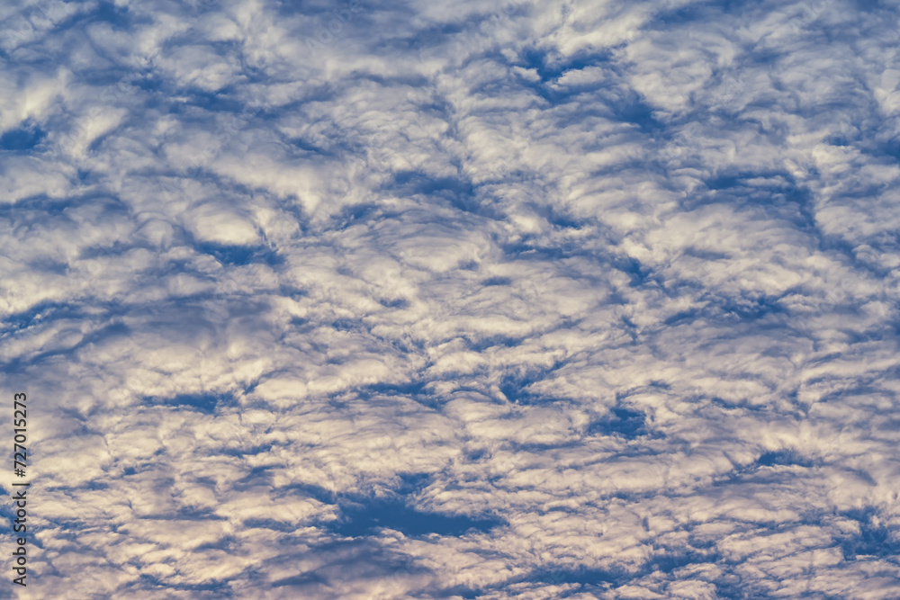 Beautiful waves of clouds against bright blue sky. Beautiful waves of clouds against bright blue sky.