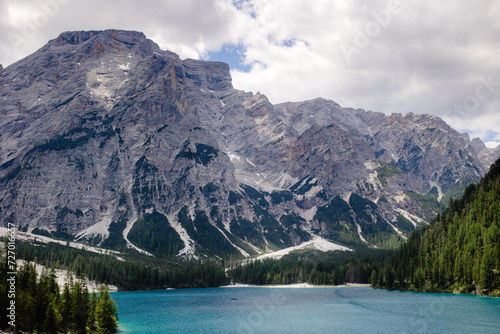 Fototapeta Naklejka Na Ścianę i Meble -  Crystal Clear Blue Lake with Majestic Rocky Mountains in the Italian Dolomites