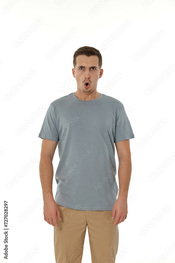surprised guy looking at camera on white studio background surprised guy looking at camera on white studio background