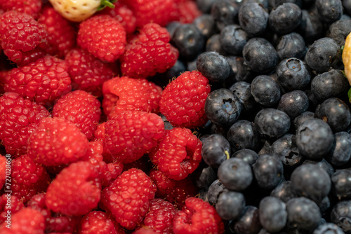 detail of organically grown raspberries and blackberries