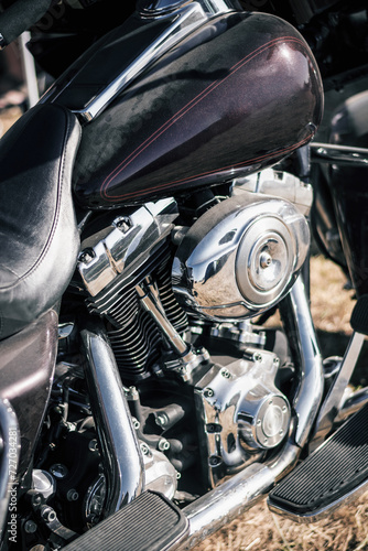 Close up of the engine of a vintage custom motorcycle. Selective focus.