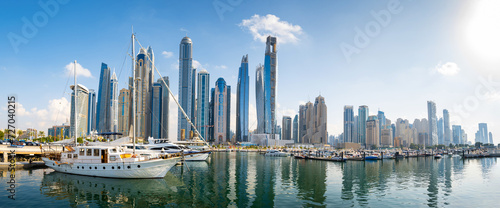 Dubai marina harbor panorama on a sunny day in the UAE