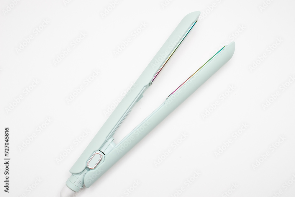 hair iron with ceramic plates on white hair iron with ceramic plates on white