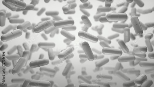 Capsules are moving upward on a grey background. Tablet pills capsules float slowly in slow motion. 3d rendering