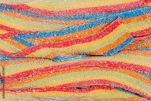 abstract background of colorful chewing marmalades texture close up