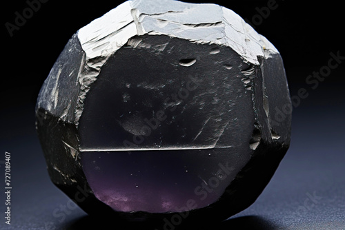 taaffeite is a rare precious natural stone on a black background. AI generated. photo