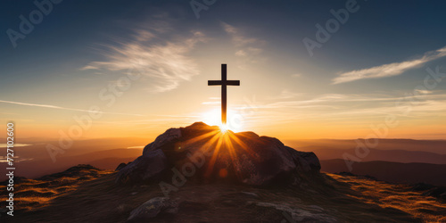 Resurrection of Faith: Silhouette of Jesus on the Cross at Sunrise, Symbolizing Love, Hope, and Salvation, against a Majestic Mountain Background