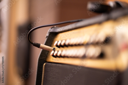 Guitar amplifier on bokeh light colored background, classic vintage rock sound. DSL20c tube amp photo