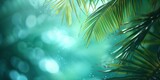 beautiful background with palm leaves and the shimmer of the blurred water of the ocean