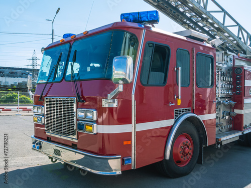 A fire truck with a retractable ladder for extinguishing fires at a height. A fire truck for the delivery of firefighters to the place of fire and the supply of extinguishing agent for extinguishing.