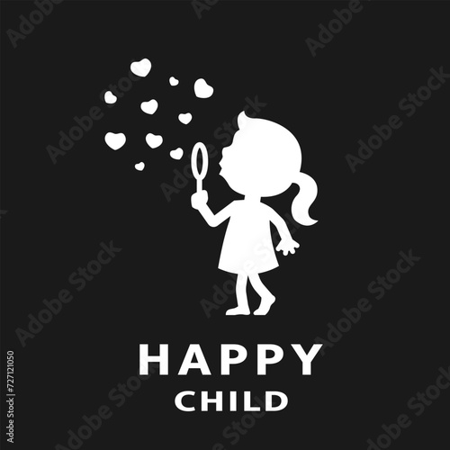 The child blows soap bubbles on a dark background.