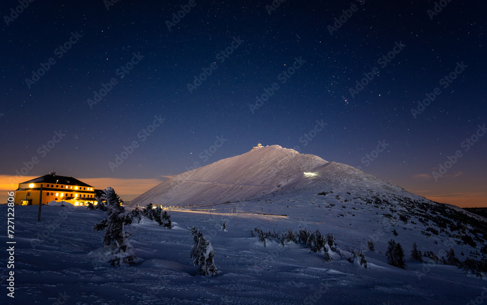 view on Sniezka mountain at night with stars sky in Giant mountains