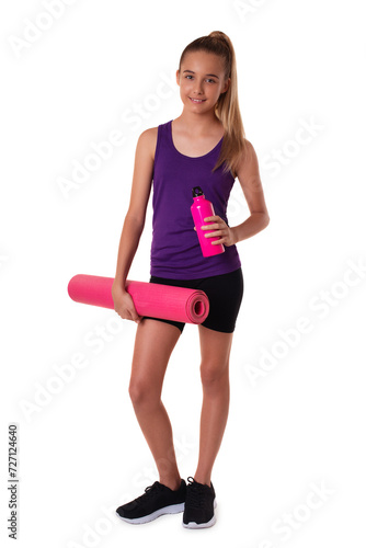 young beautiful slim teen girl holding the yoga mat and water bottle. Full length shot isolated on white background