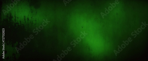 Elegant dark emerald green background with black shadow border and old vintage grunge texture design. Matte green texture or background with stains, waves and grain elements. photo