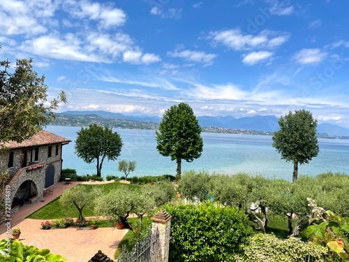 sky, tree, nature, landscape, park, arriving, architecture, house, italy, plant, tropical, property, water, Italy, europe, lake garda