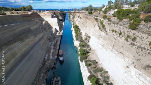 Corinth Canal Connecting The Gulf Of Corinth With Saronic Gulf In Aegean Sea, Greece - aerial drone shot