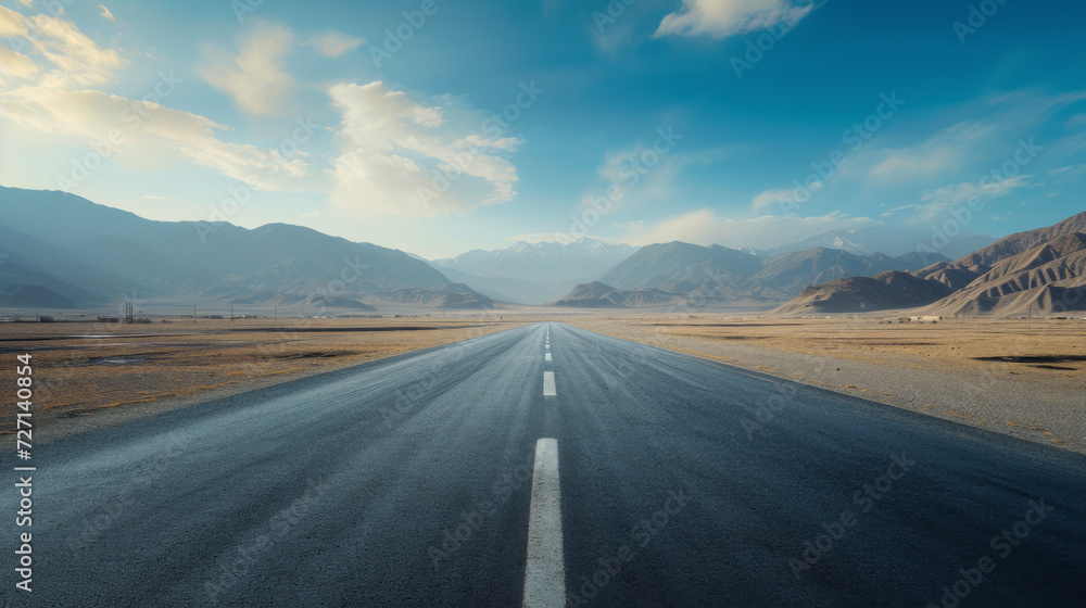 Empty desert road and city