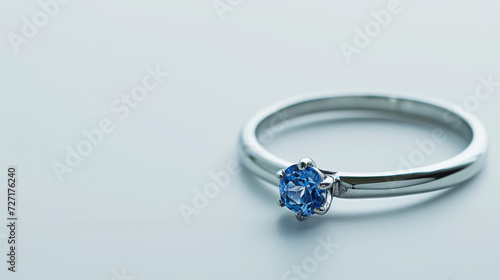 "A Luxurious and Expensive Women's Ring Featuring a Captivating Blue Topaz Gemstone, Isolated on a White Background."