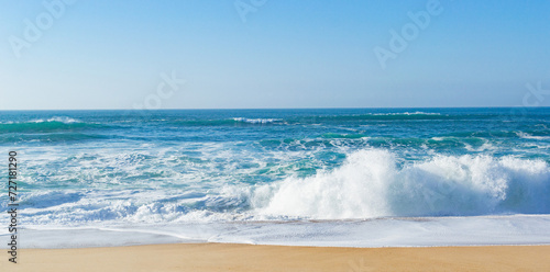 Fototapeta Naklejka Na Ścianę i Meble -  Beautiful ocean waves on a golden sand beach. Alone with nature.