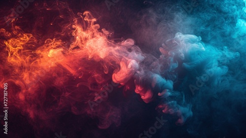 Multicolored smoke on dark background with ink-like hues.