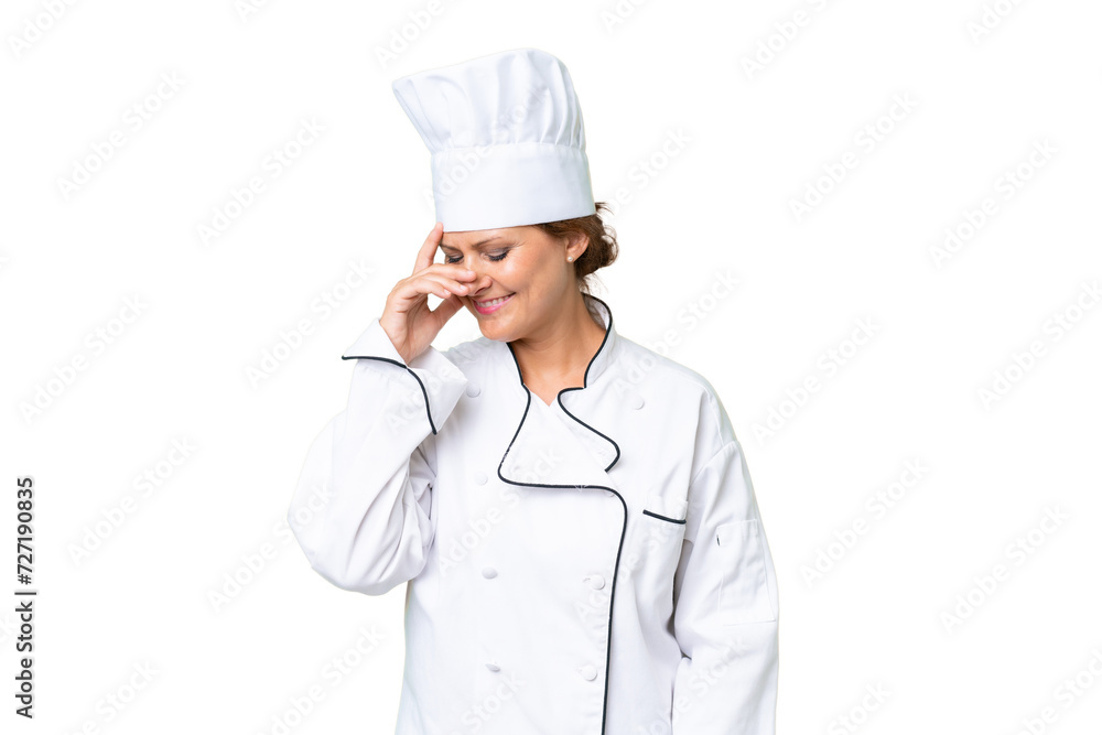 Middle-aged chef woman over isolated background laughing Middle-aged chef woman over isolated background laughing