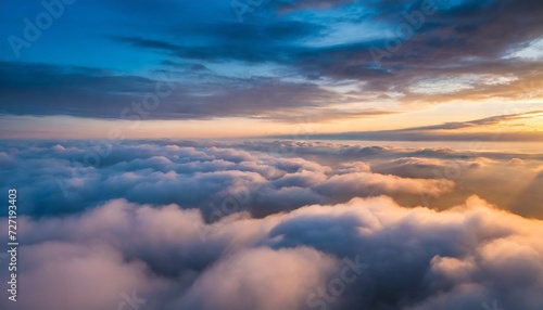 view of the clouds from above at dawn