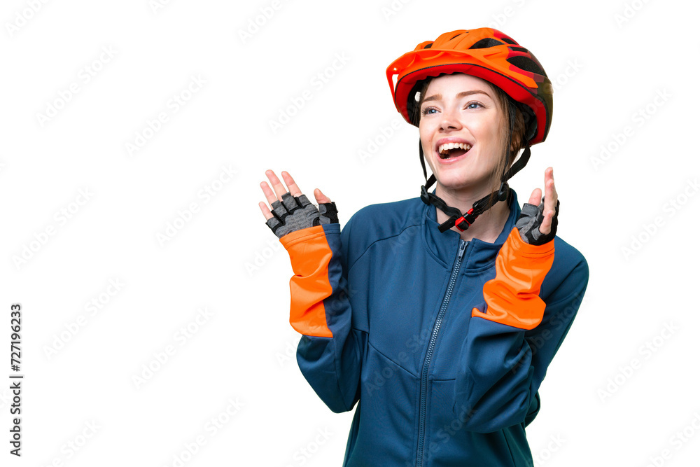 Young cyclist woman over isolated chroma key background with surprise facial expression Young cyclist woman over isolated chroma key background with surprise facial expression