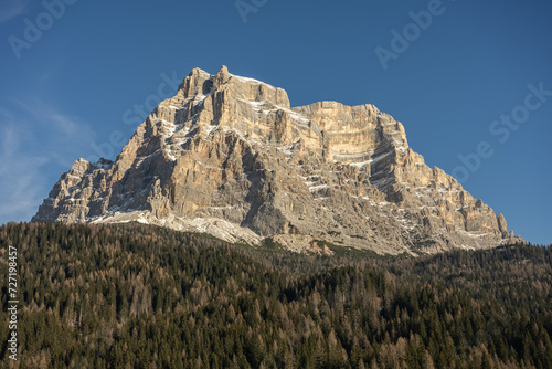 Civetta resort. Panoramic view of the Dolomites mountains in winter, Italy. Ski resort in Dolomites, Italy. Aerial  drone view of ski slopes and mountains in dolomites. © Chawran