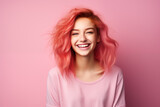 Young pink haired woman over isolated colorful background