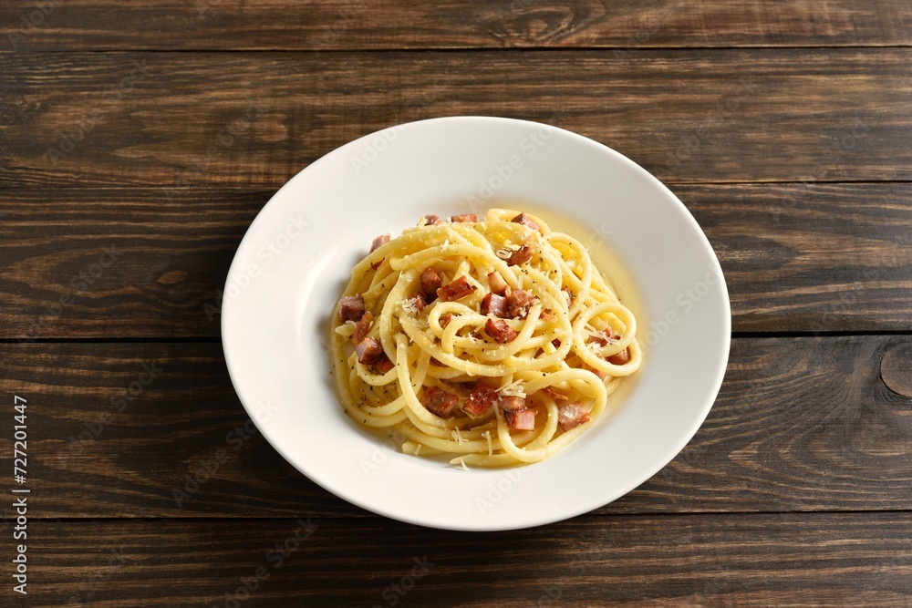 Carbonara pasta, spaghetti with crisp pancetta bacon and black pepper