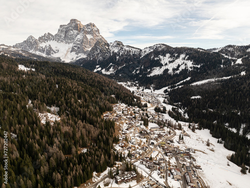 Santa Fosca Civetta resort. Panoramic view of the Dolomites mountains in winter, Italy. Ski resort in Dolomites, Italy. Aerial drone view of Santa Foscaski slopes and mountains in dolomites.