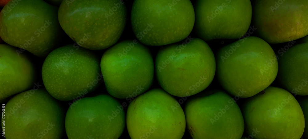 MAKASSAR, INDONESIA Asia, February 2 2024 neatly arranged green apples for sale in a shop MAKASSAR, INDONESIA Asia, February 2 2024 neatly arranged green apples for sale in a shop