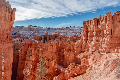 Bryce canyon national park in winter, unique rock formations in utah covered in snow, orange rocks in snow, cold winter in the usa