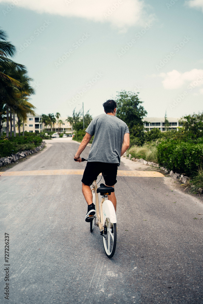 Fototapeta premium person riding a bike