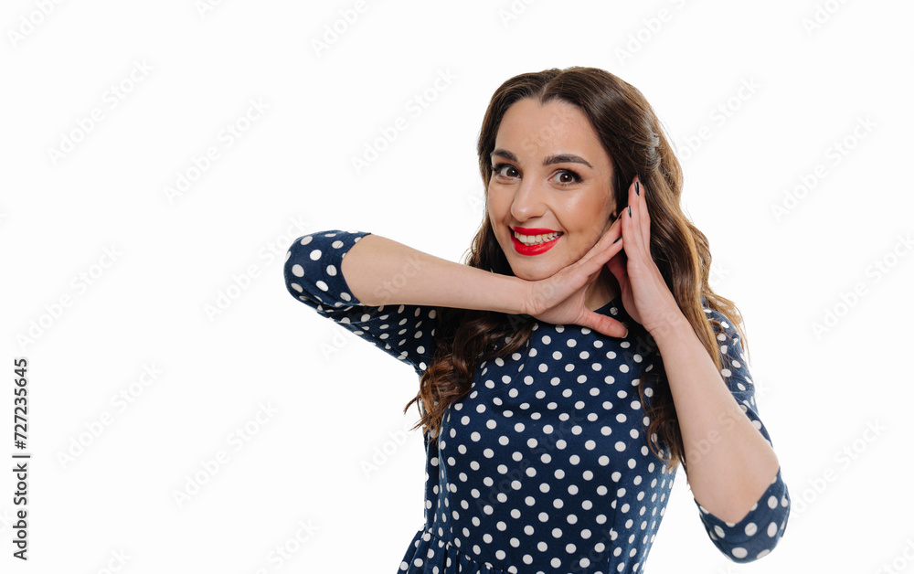 Beautiful young woman in blue dress shows gesture with her hands isolated on white background Beautiful young woman in blue dress shows gesture with her hands isolated on white background