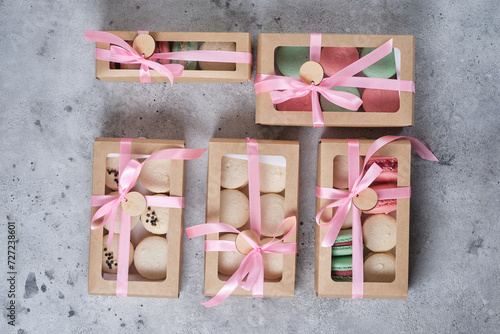 A box with classic French macarons. Delicious and beautiful cakes.