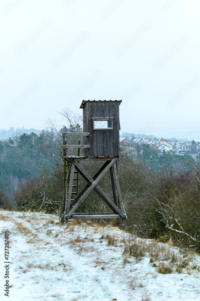 Wooden lookout tower for hunting in the woods and on meadow
Wooden lookout tower for hunting in the woods and on meadow