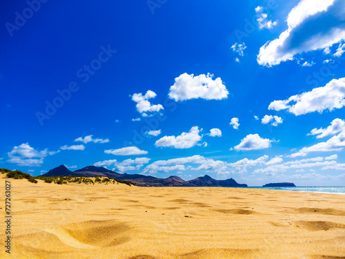 Sand beach and colorful sky on Porto Santo island  photo