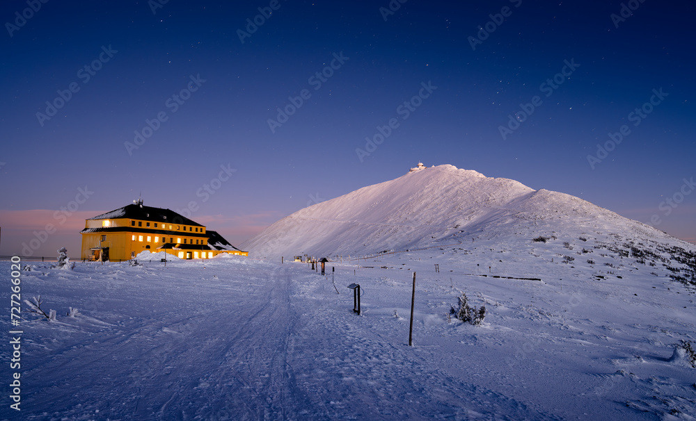Sniezka mountain at dusk during winter in Giant mountains
