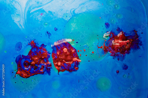 Hintergrund-Fotografie von Blasen und Tropfen mit Tinte in einem Wasserbehälter mit Psychedelisch anmutender Wirkung als Hintergrund oder Screen für Copytext und Animation