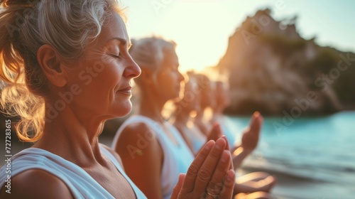 Group of senior woman practicing yoga with beautiful landscape
